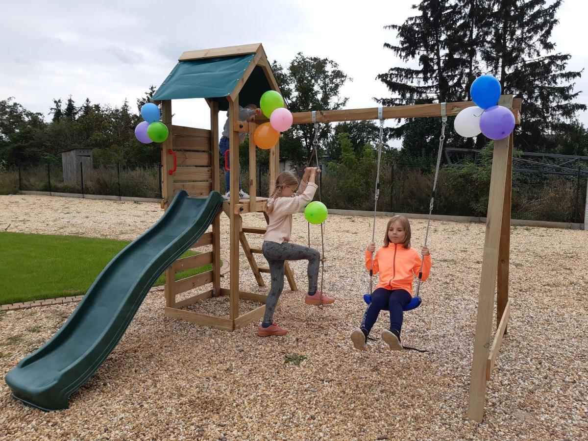 Boutique Odyseja & Spa Ciechocinek Dış mekan fotoğraf Playground in the village