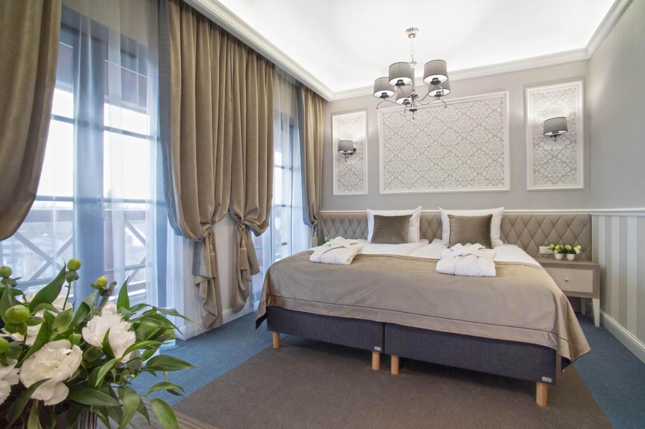 Boutique Odyseja & Spa Ciechocinek Dış mekan fotoğraf A bedroom in the hotel