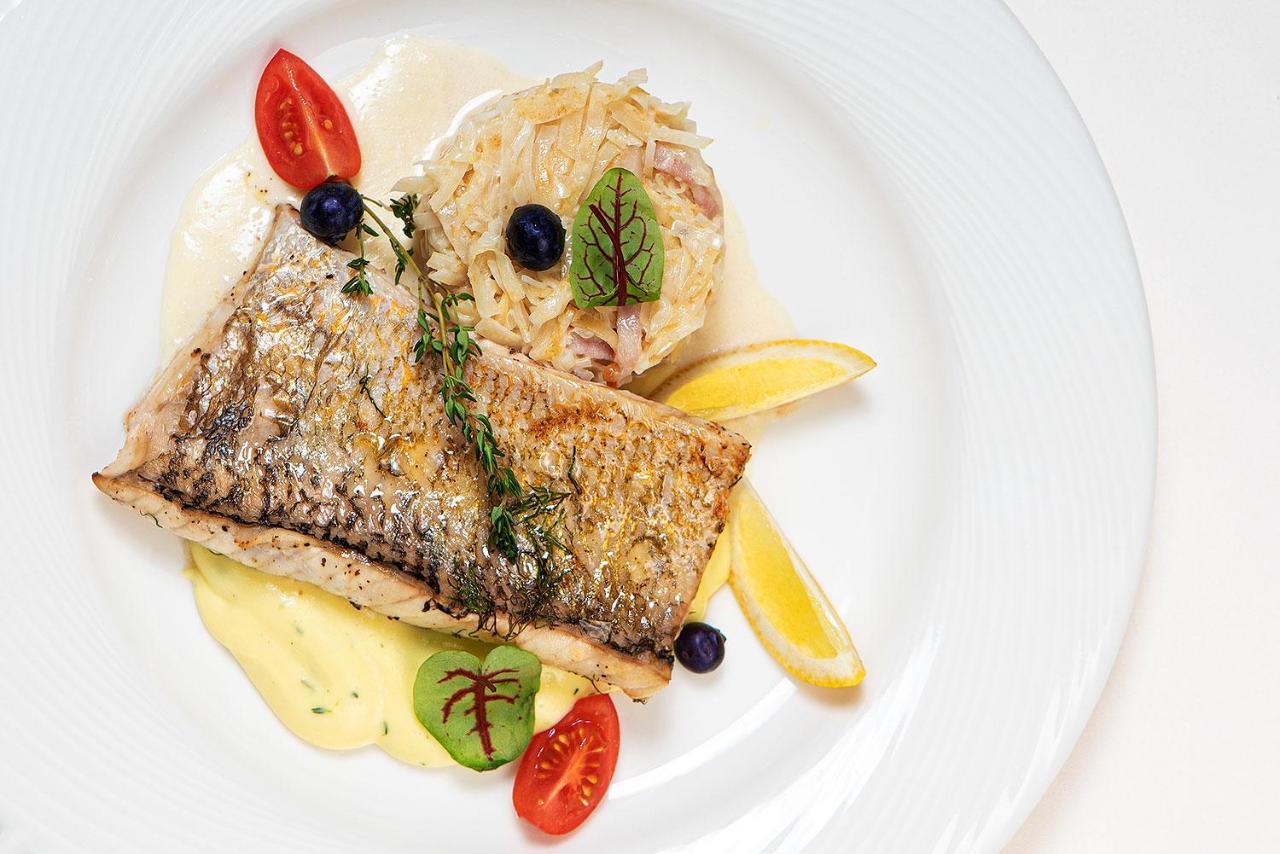 Boutique Odyseja & Spa Ciechocinek Dış mekan fotoğraf A prepared dish of Arctic char