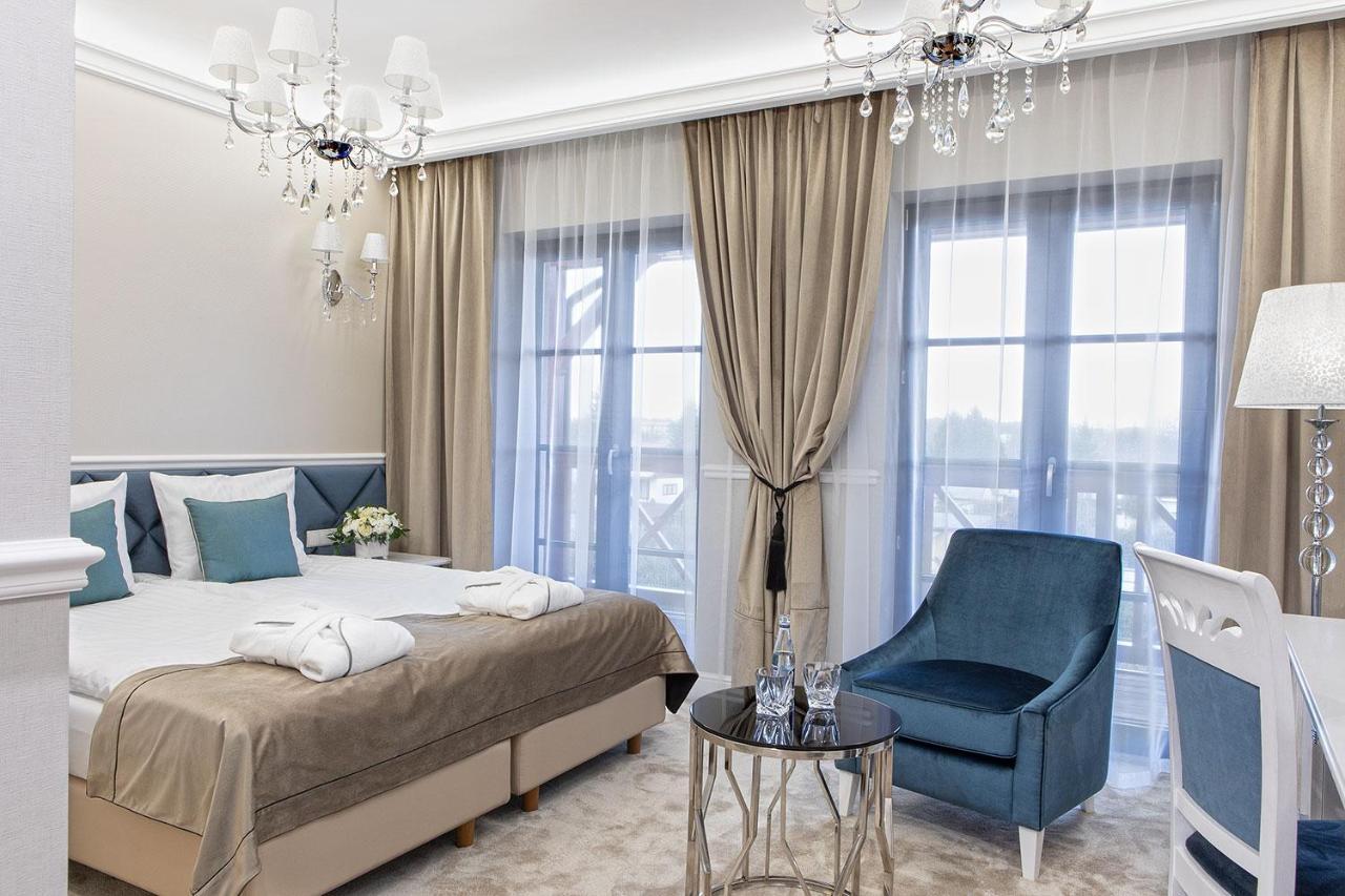 Boutique Odyseja & Spa Ciechocinek Dış mekan fotoğraf A bedroom in the hotel